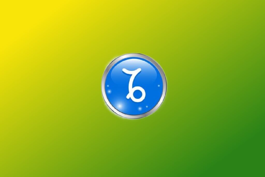 Ilustração do signo de Capricórnio com símbolo branco curvo dentro de um círculo azul com contorno prateado sobre fundo verde e amarelo