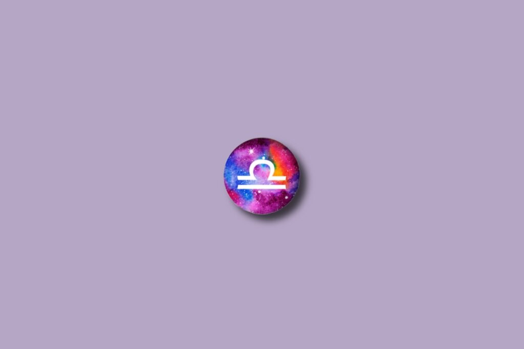 Ilustração do signo de libra em um círculo colorido e sobre um fundo roxo
