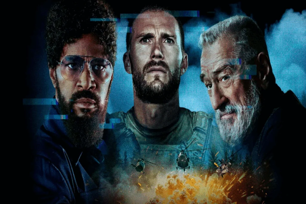 Imagem de três homens um ao lado do outro com expressões sérias, um deles tem o cabelo cacheado e está usando uma roupa azul-escura e um óculos azul e barba, o outro tem o cabelo curto e barba e está usando uma camiseta verde e o outro tem o cabelo branco e a barba branca e está usando uma roupa preta. Com uma explosão e helicópteros embaixo.