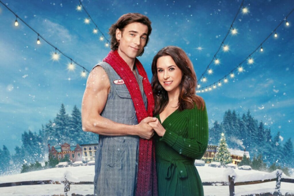 Capa do filme "Um amor feito de neve" com os dois protagonistas um do lado do outro segurando as mãos