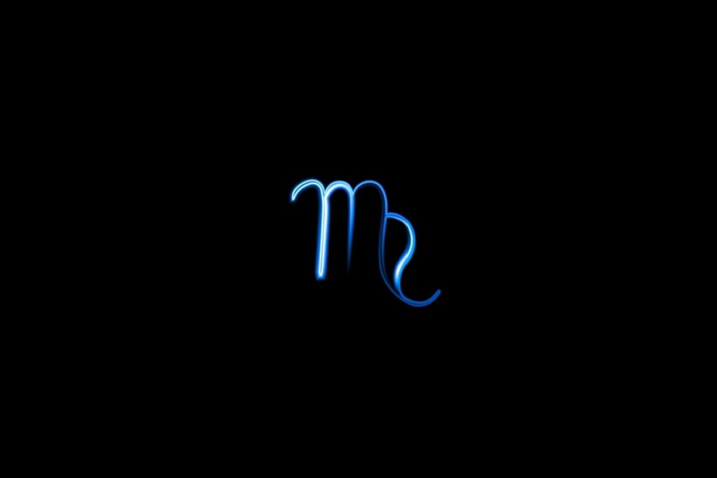 Ilustração do signo de virgem em azul sobre um fundo preto