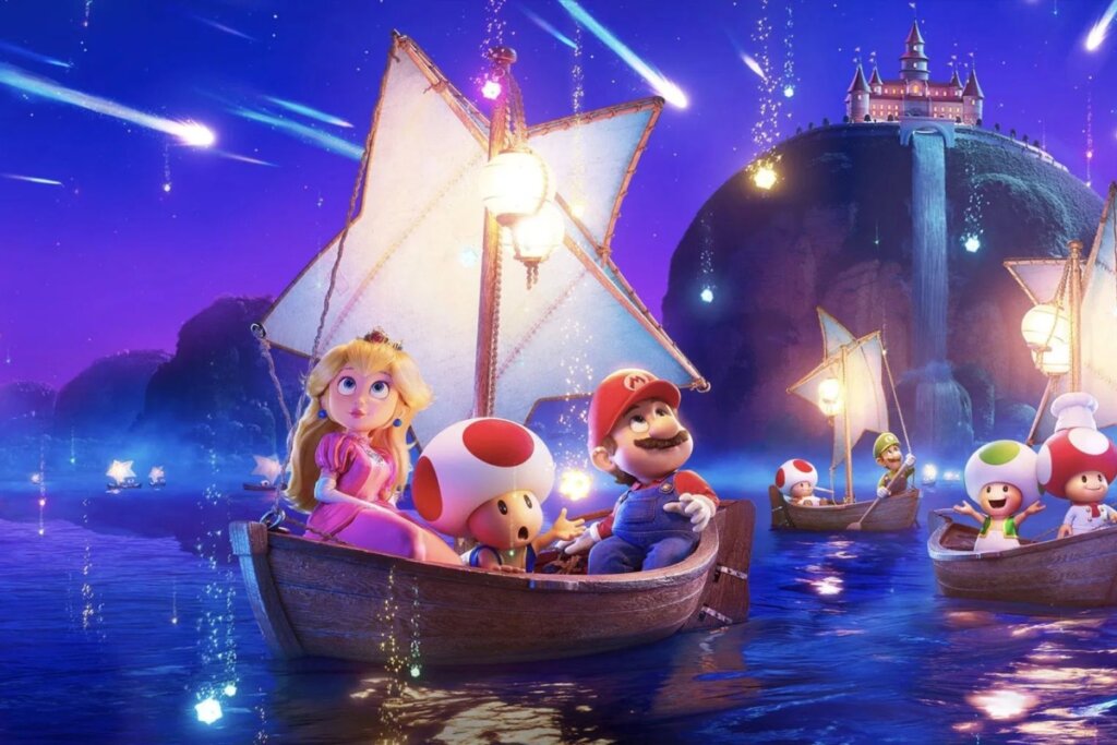 Ilustração digital vibrante mostrando personagens da franquia Super Mario em barcos de madeira sobre um mar azul brilhante à noite. Em primeiro plano, Princesa Peach, Toad e Mario olham maravilhados para o céu, que está repleto de estrelas cadentes e pontos de luz. Ao fundo, Luigi e outros Toads aparecem em barcos menores, com o castelo da princesa iluminado no topo de uma colina distante.
