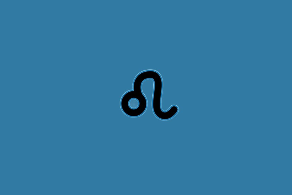 Ilustração do signo de leão na cor preta sobre um fundo azul