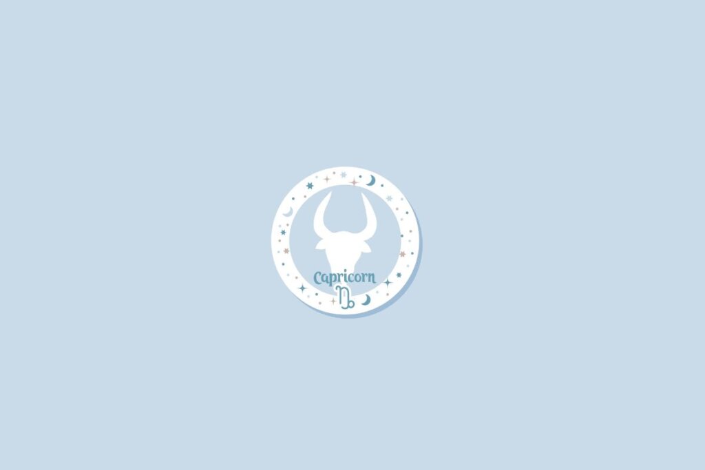 Símbolo do signo de capricórnio sobre fundo azul-claro, com detalhes de estrelas e luas distribuídos ao redor em um círculo branco