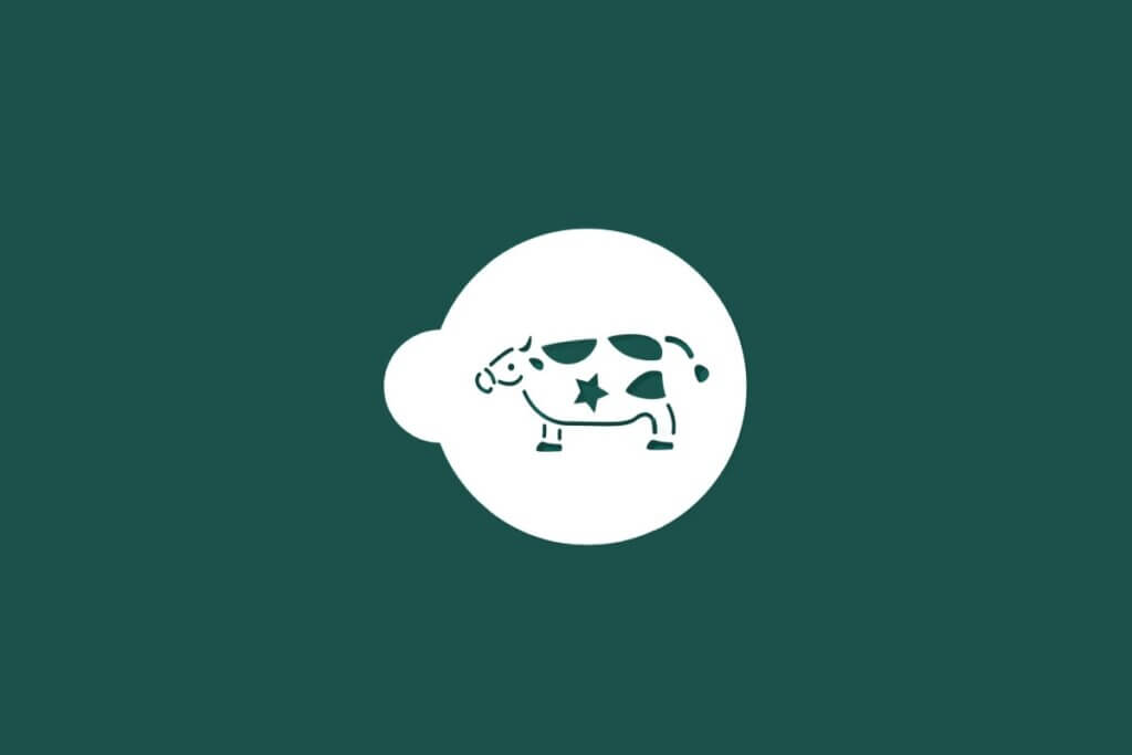 Ilustração do signo de Touro contendo um touro com estrela em fundo verde-escuro