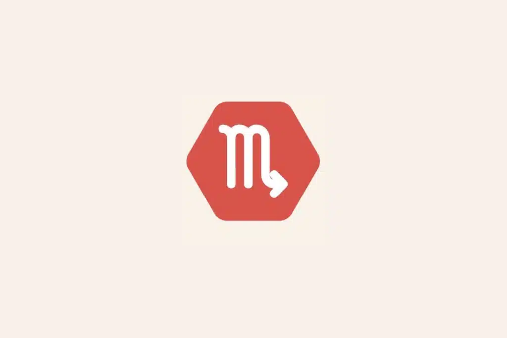 Ilustração do signo Escorpião, com símbolo branco em forma de "M" com seta na ponta final em hexágono vermelho em fundo bege