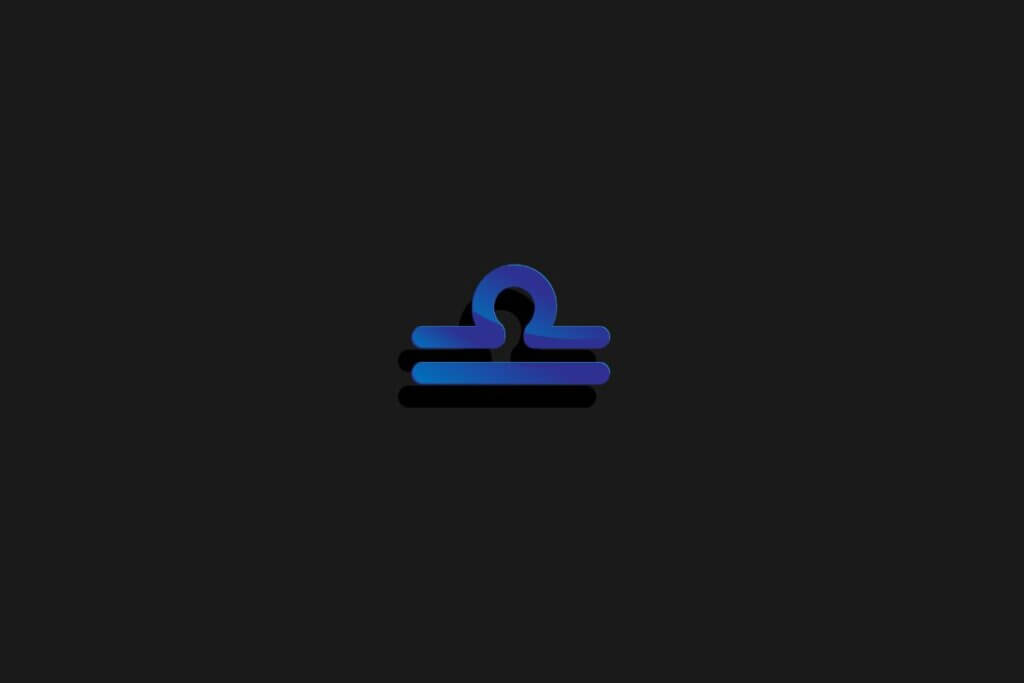 Símbolo do signo de libra na cor azul e centralizado em um fundo preto