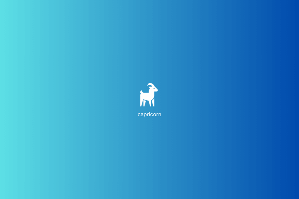 Símbolo do signo de Capricórnio em branco em fundo em tons de azul