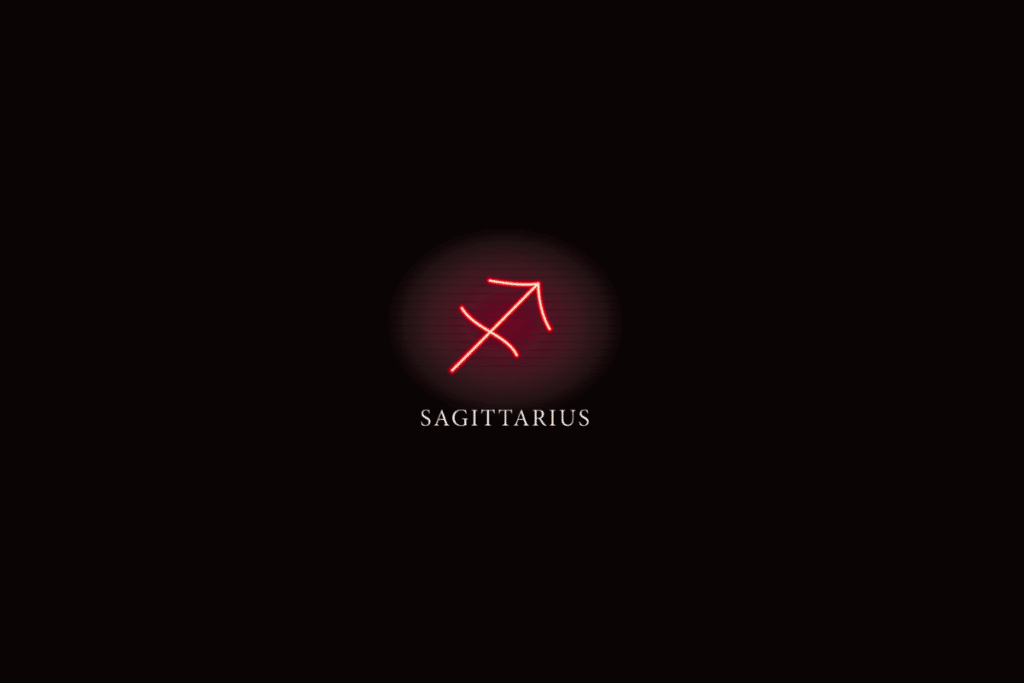 Ilustração do símbolo do signo de sagitário em vermelho, com o nome do signo abaixo, sobre fundo preto