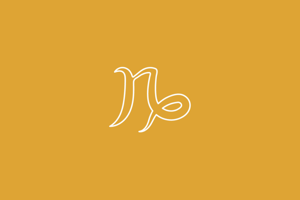 Símbolo do signo de Capricórnio desenhado em linhas brancas, centralizado sobre um fundo amarelo-ocre
