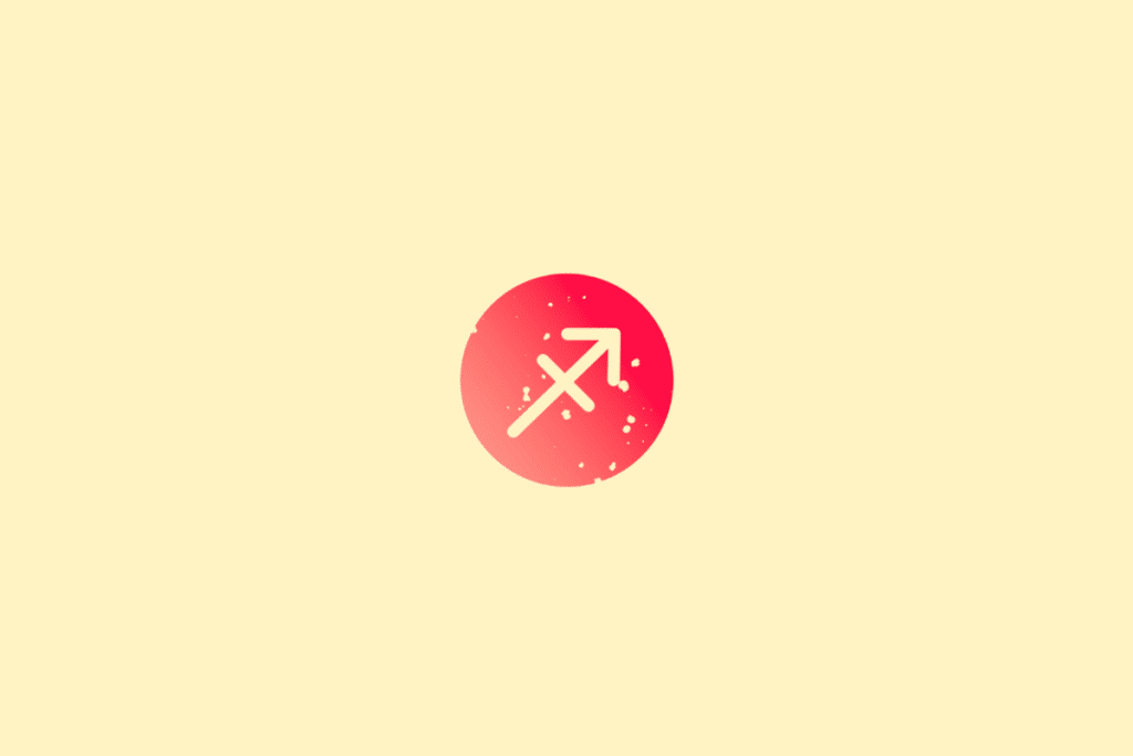 Ilustração minimalista do signo de Sagitário, representado pelo símbolo de uma flecha apontada para o alto, em tom creme. A figura aparece sobre um círculo em degradê de vermelho e rosa, com pequenos pontos decorativos e fundo amarelo-claro.